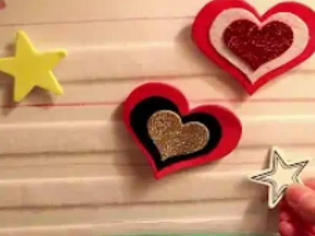 bulletin board with hearts and stars setup
