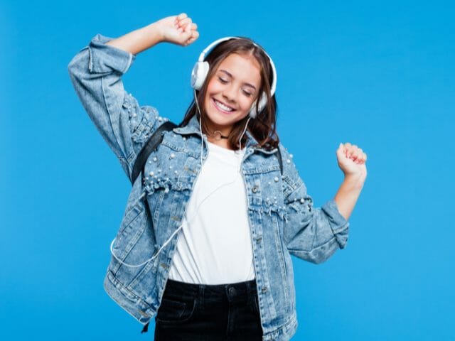 high school student with headphone listening to music