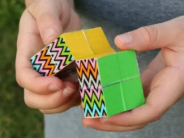 man holding duck tape endless cube 