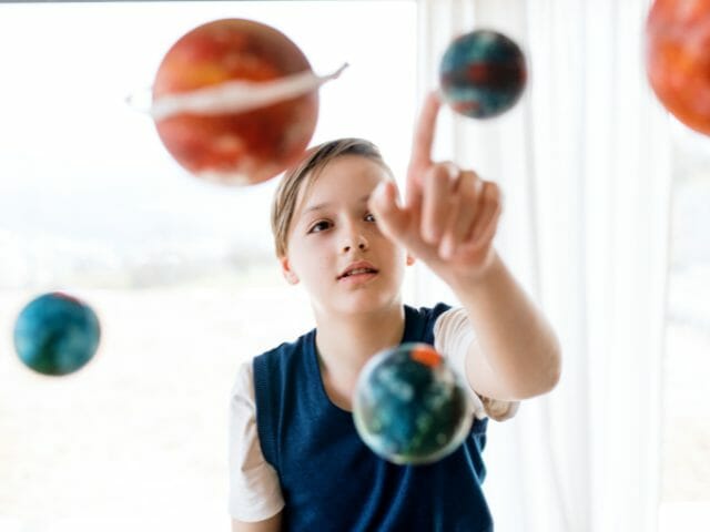 small boy solar system indoor