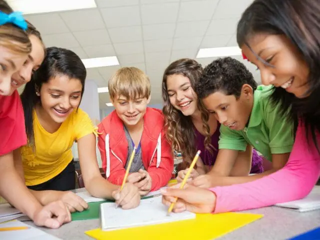 students writing classroom activity