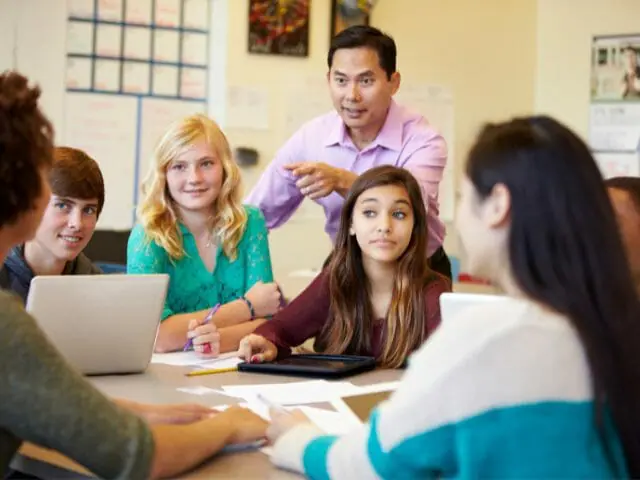 teacher and students in a class discussion